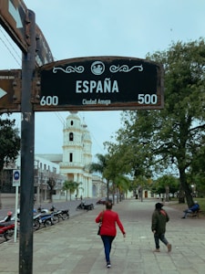 A street with a prominent sign reading 