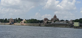 Serene view of Ayodhya’s Ram Mandir framed by lush greenery and gentle morning light.