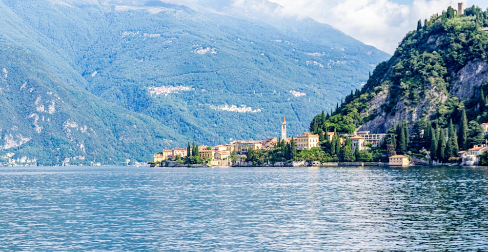 a lake with a small village in the middle of it