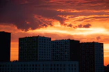 Urban skyline view at sunset showcasing premium real estate.