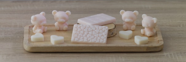 A serene display of handmade spiritual soaps with natural ingredients arranged on a wooden tray