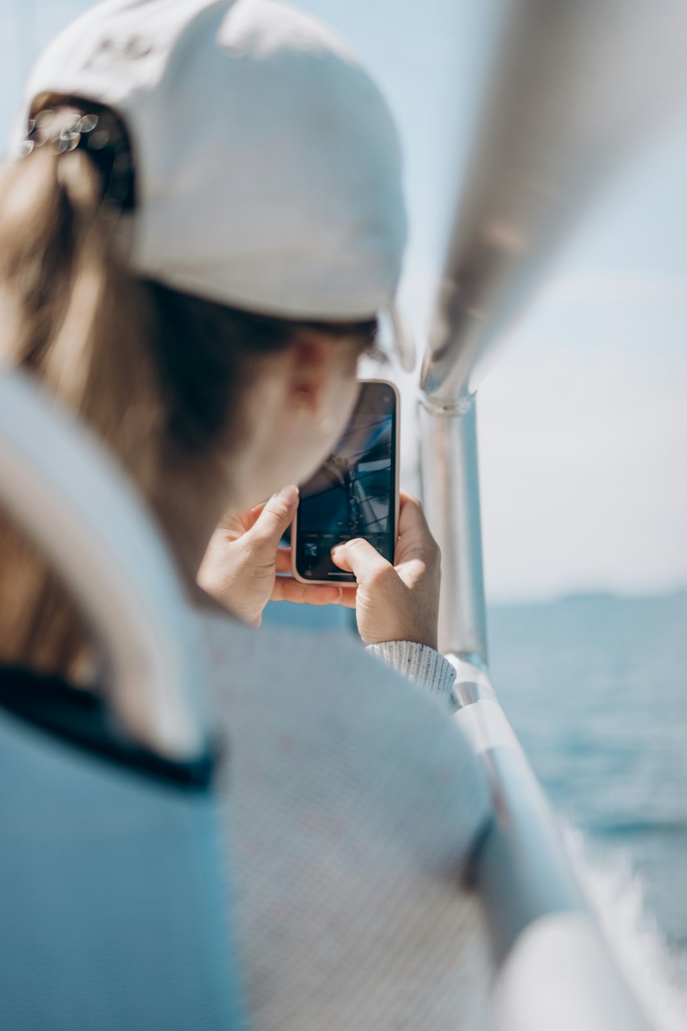 a person taking a picture of themselves on a boat