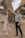a man and a woman dancing in front of a tree