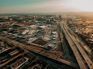 an aerial view of a highway in a city