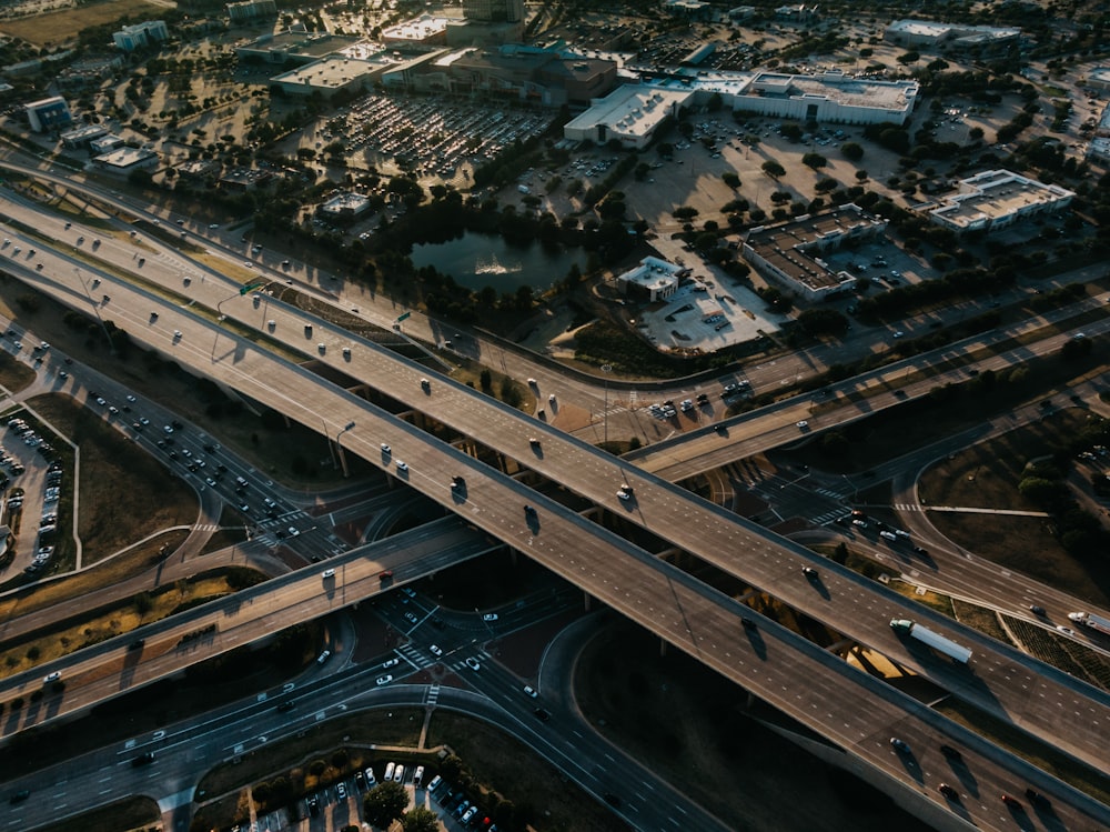 an aerial view of a highway intersection in a city