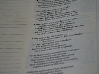 A close-up image of a page from a book showing text in two distinct columns. The text includes numbered sections with sentences, and there are dotted lines adjacent to the text, likely for note-taking.
