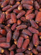 a close up of a pile of raisins