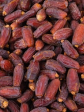 a close up of a pile of raisins