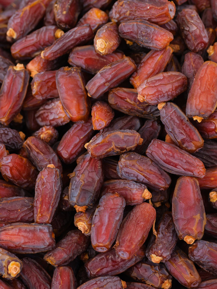 Dark soft dates piled close and loose