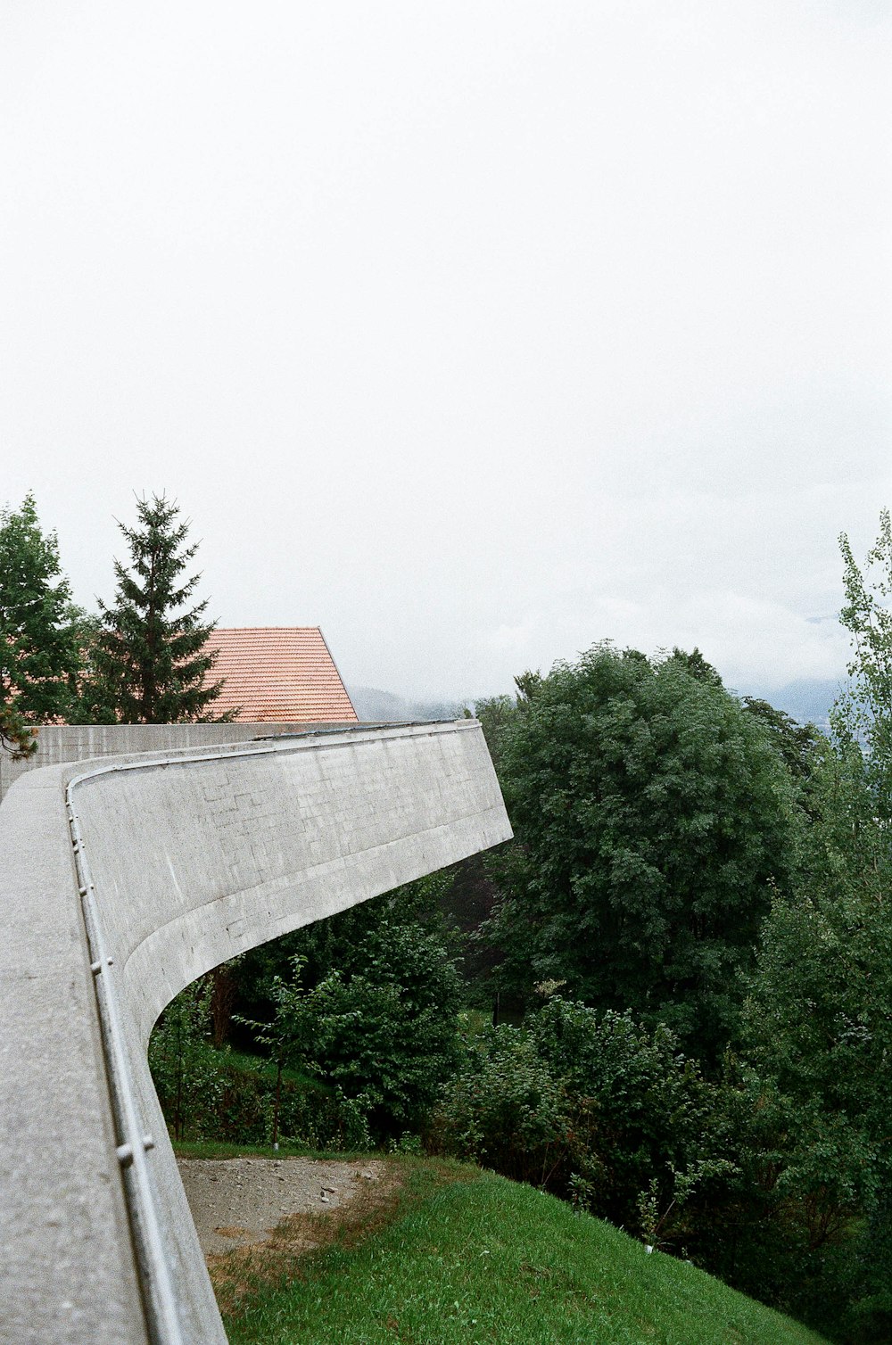 a man riding a skateboard down the side of a ramp