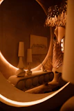 Elegant wall art pieces hanging above a minimalist console table with soft ambient lighting.