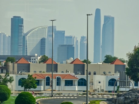 a view of a city with tall buildings in the background