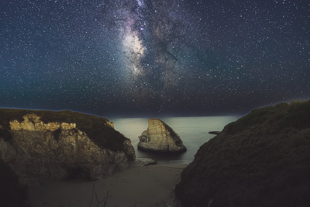 a view of the night sky over the ocean