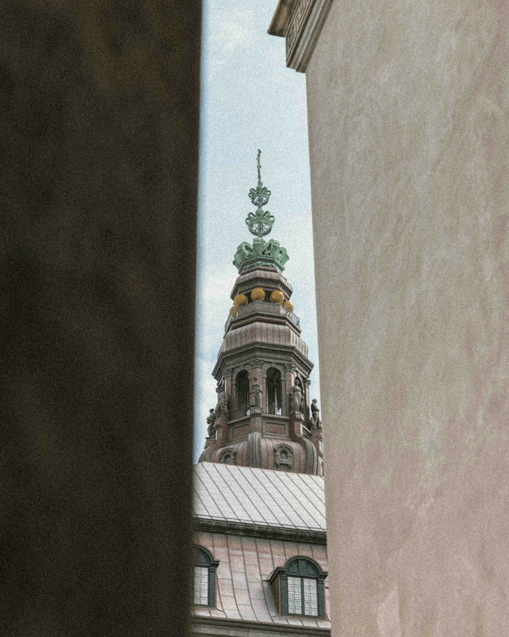 a tall building with a clock on the top of it