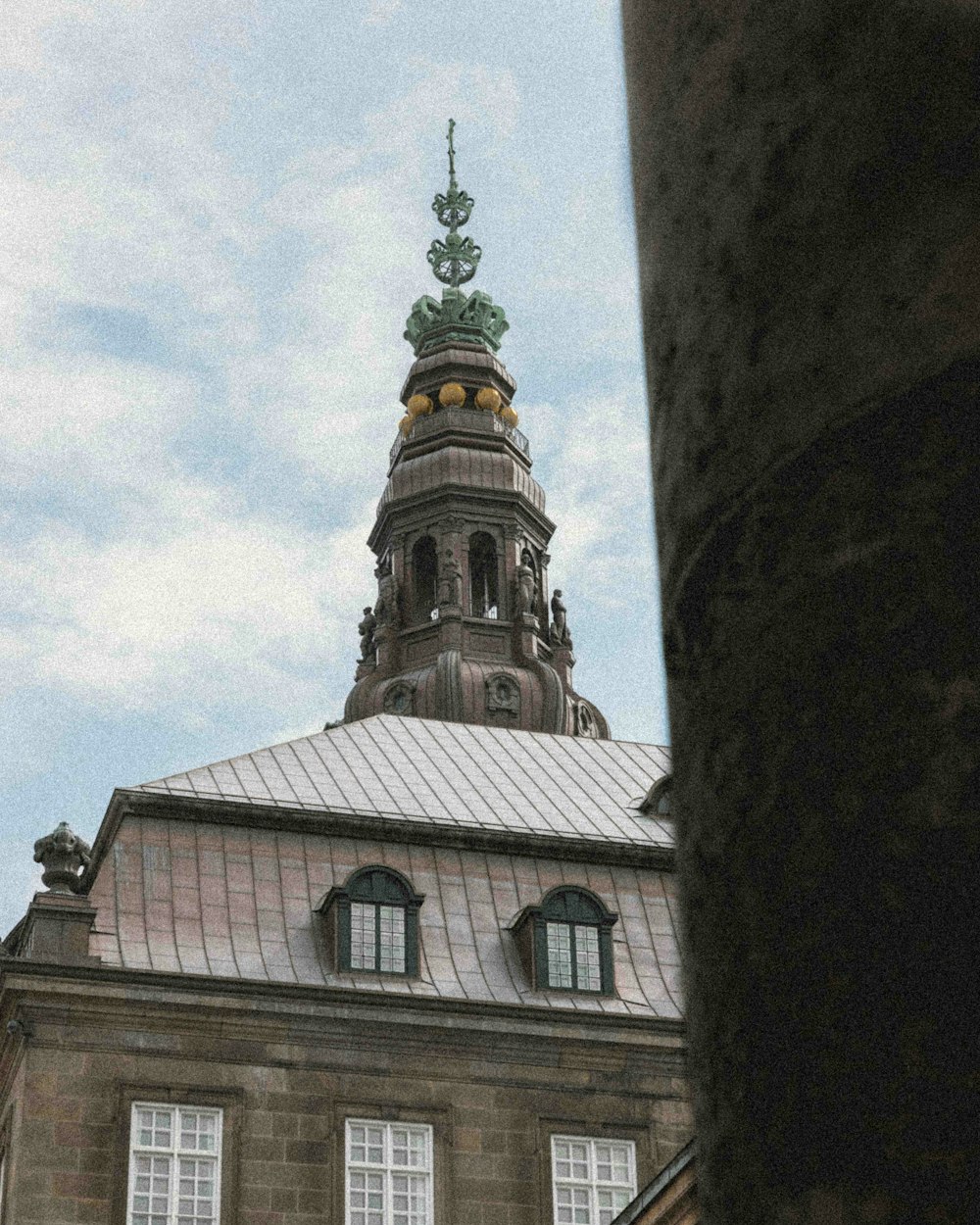 a tall building with a clock on the top of it