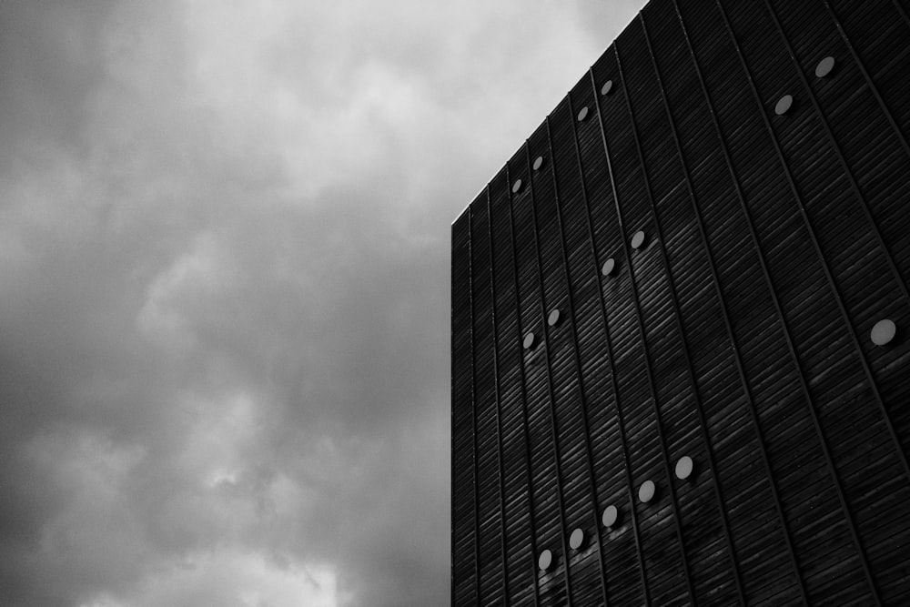 a black and white photo of a tall building