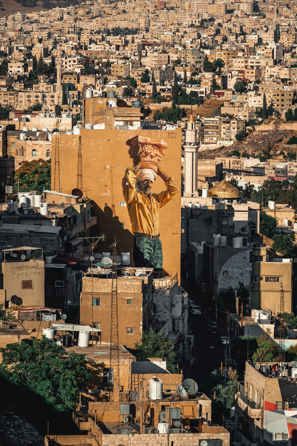 a man standing on top of a tall building