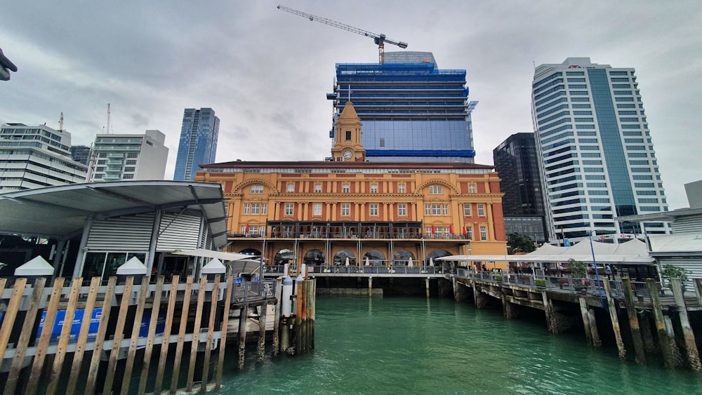 a large building sitting next to a body of water