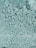 A frosted glass surface with a textured pattern resembling bubbles or raindrops. The light reflects off the uneven surface, creating varying shades and a sense of depth.