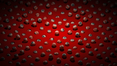 A close-up of various custom-made artificial eyes displayed on a soft surface.