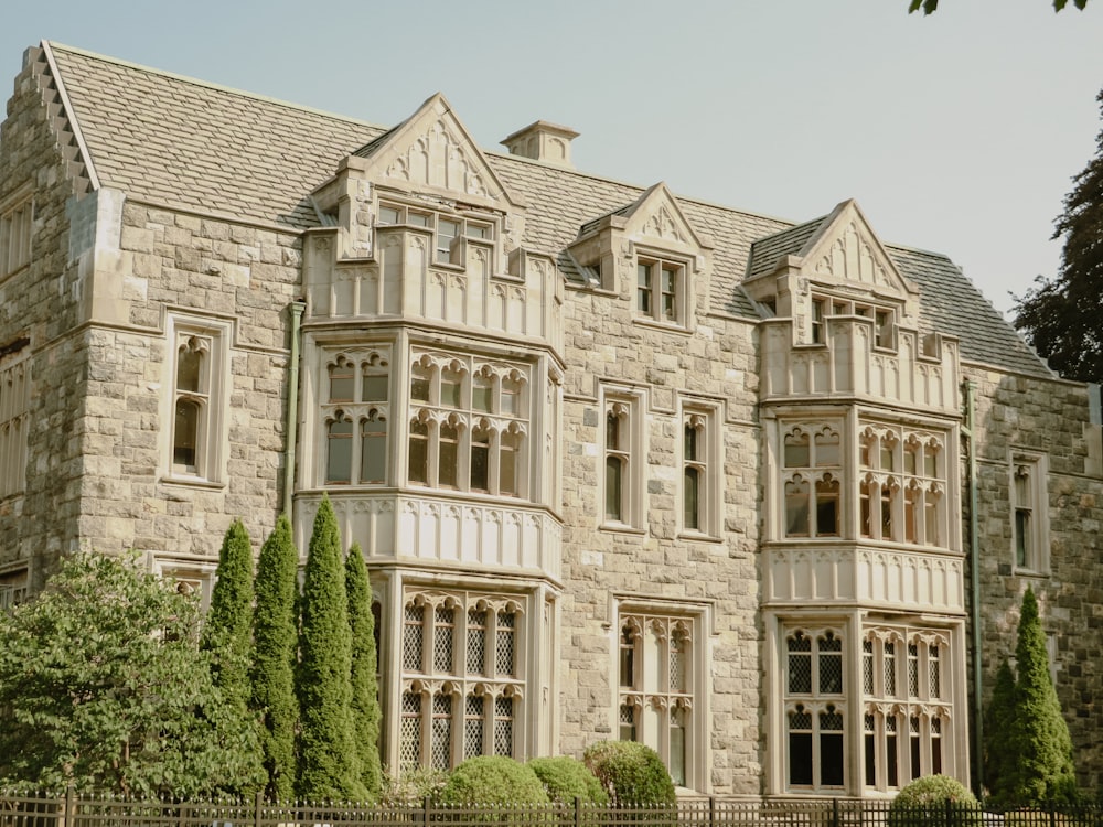 a large stone building with lots of windows