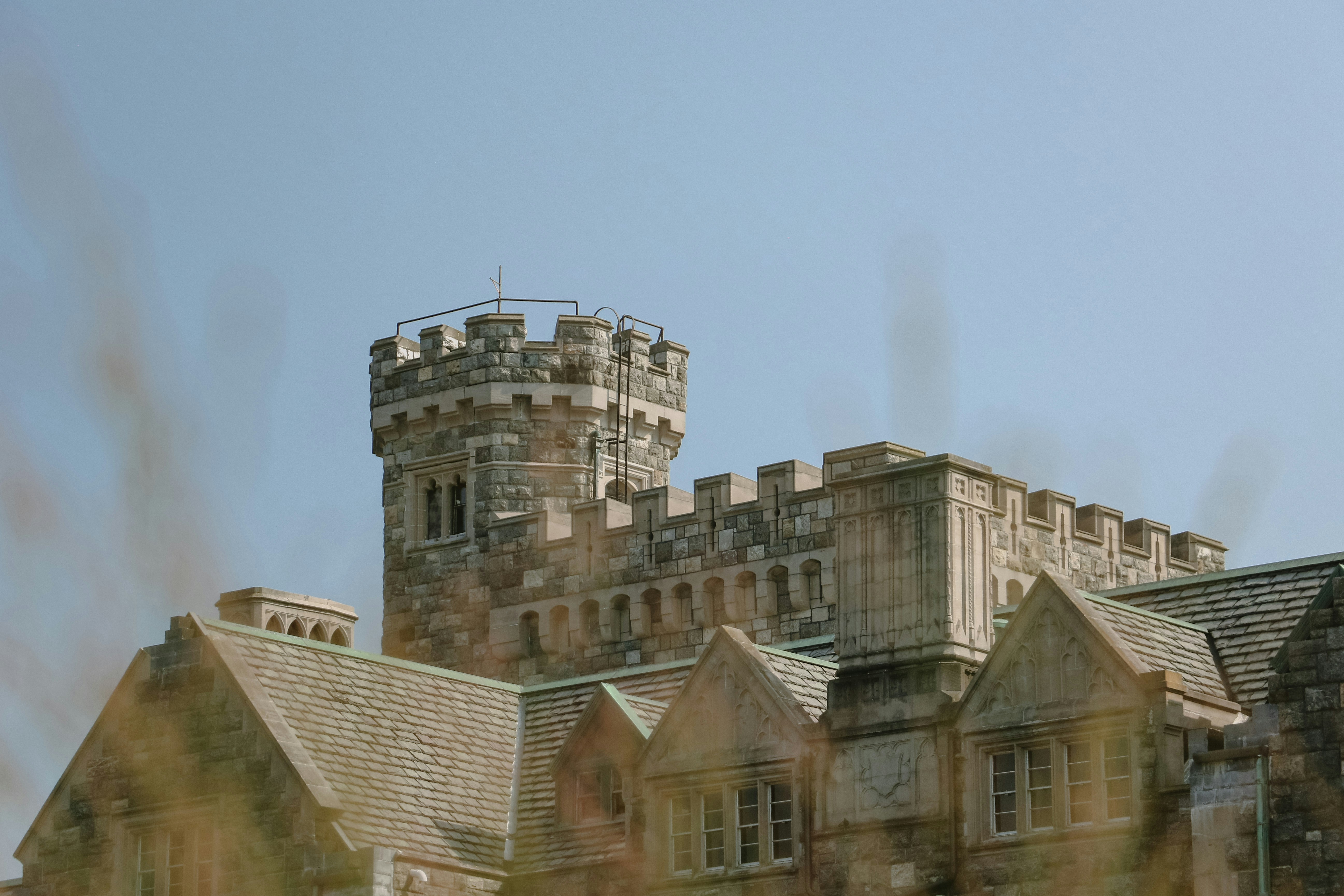 a castle like building with a clock tower on top