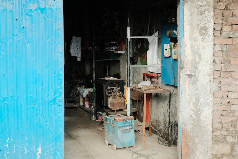 a room with a blue wall and a blue door