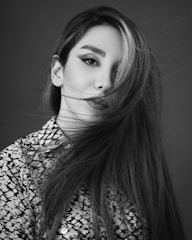 Artistic black and white fashion portrait capturing modern elegance.