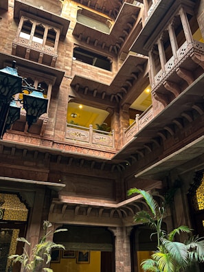 A charming courtyard of a Lucknow BnB with traditional decor and warm lighting.