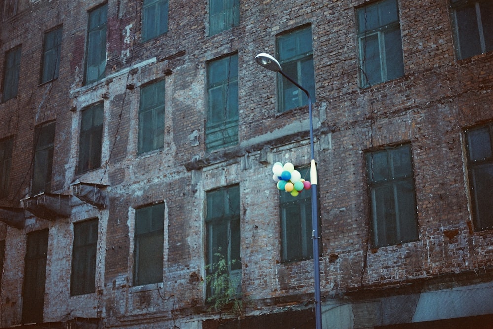 a tall brick building with lots of windows