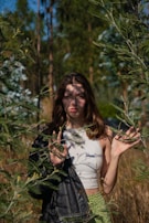 A model wearing a minimalist yet elegant uyan jacket outdoors in soft natural light.