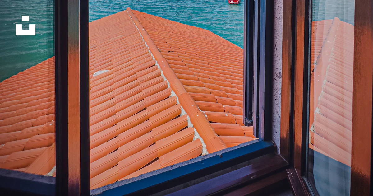 Window Water View A view of a body of water through a window photo – Free Boat Image on ...