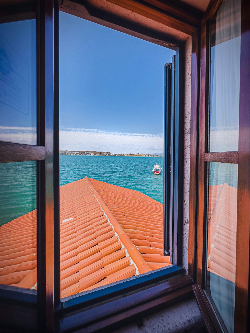 a view of a body of water through a window