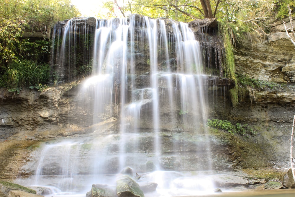 a large waterfall with lots of water coming out of it