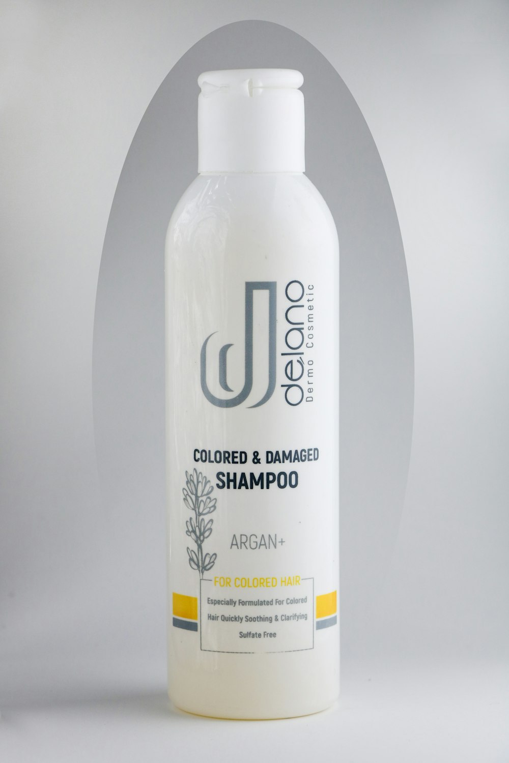 a bottle of joico colored and damaged shampoo