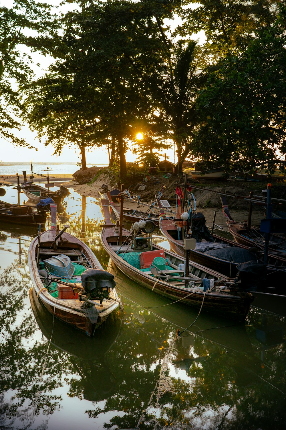 a couple of boats that are sitting in the water