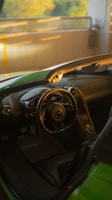 Interior view of a sleek sports car showing detailed dashboard and steering wheel.