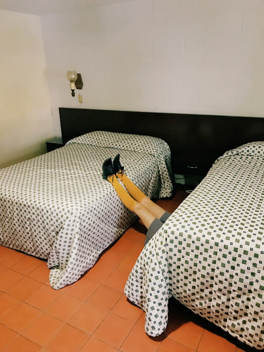 a couple of beds sitting next to each other
