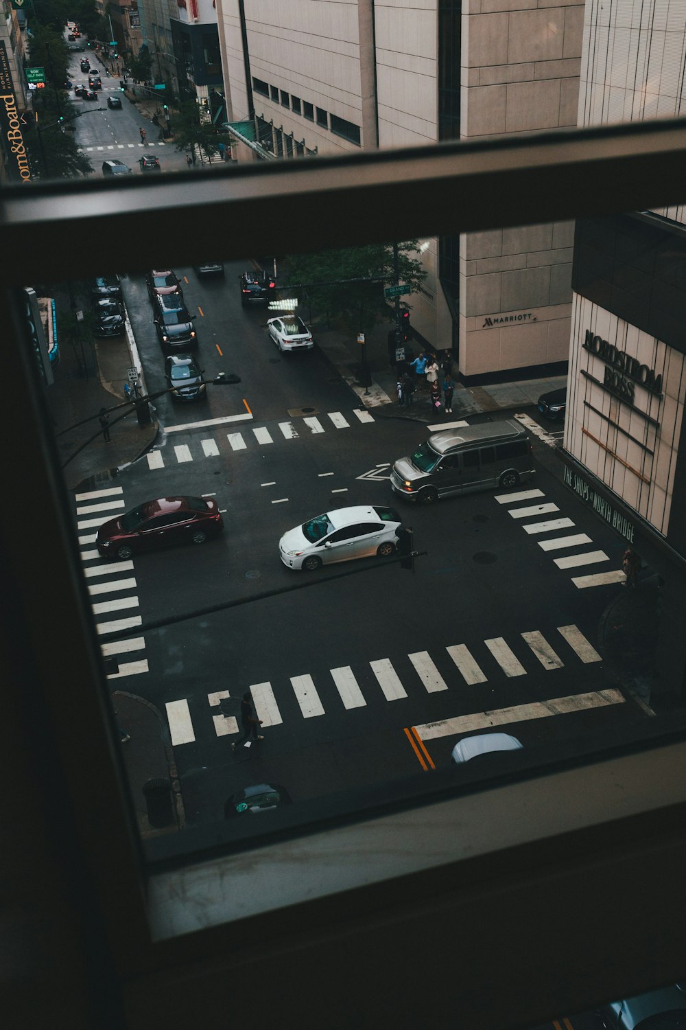 a view of a city street from a window