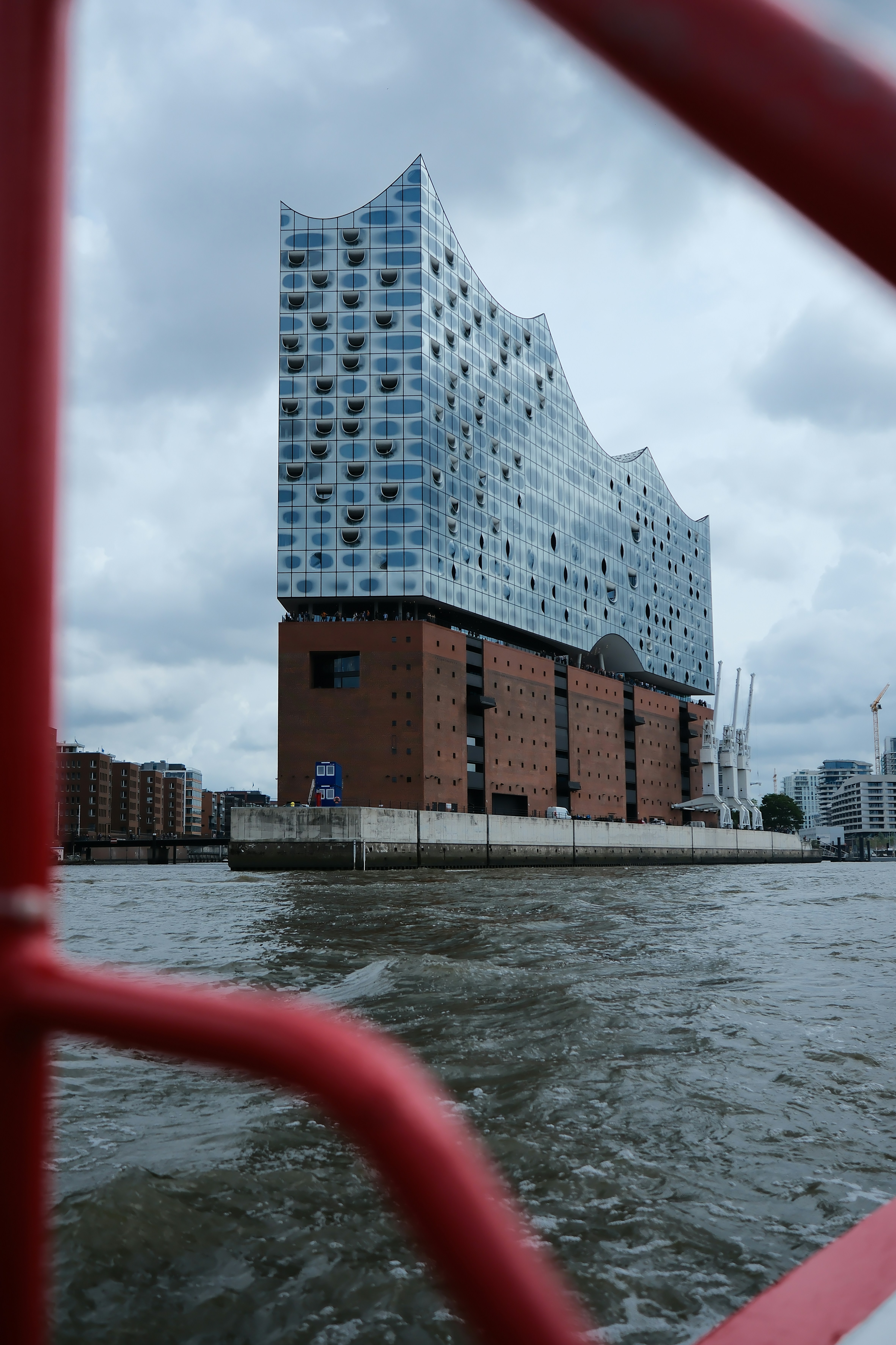 a large building sitting next to a body of water