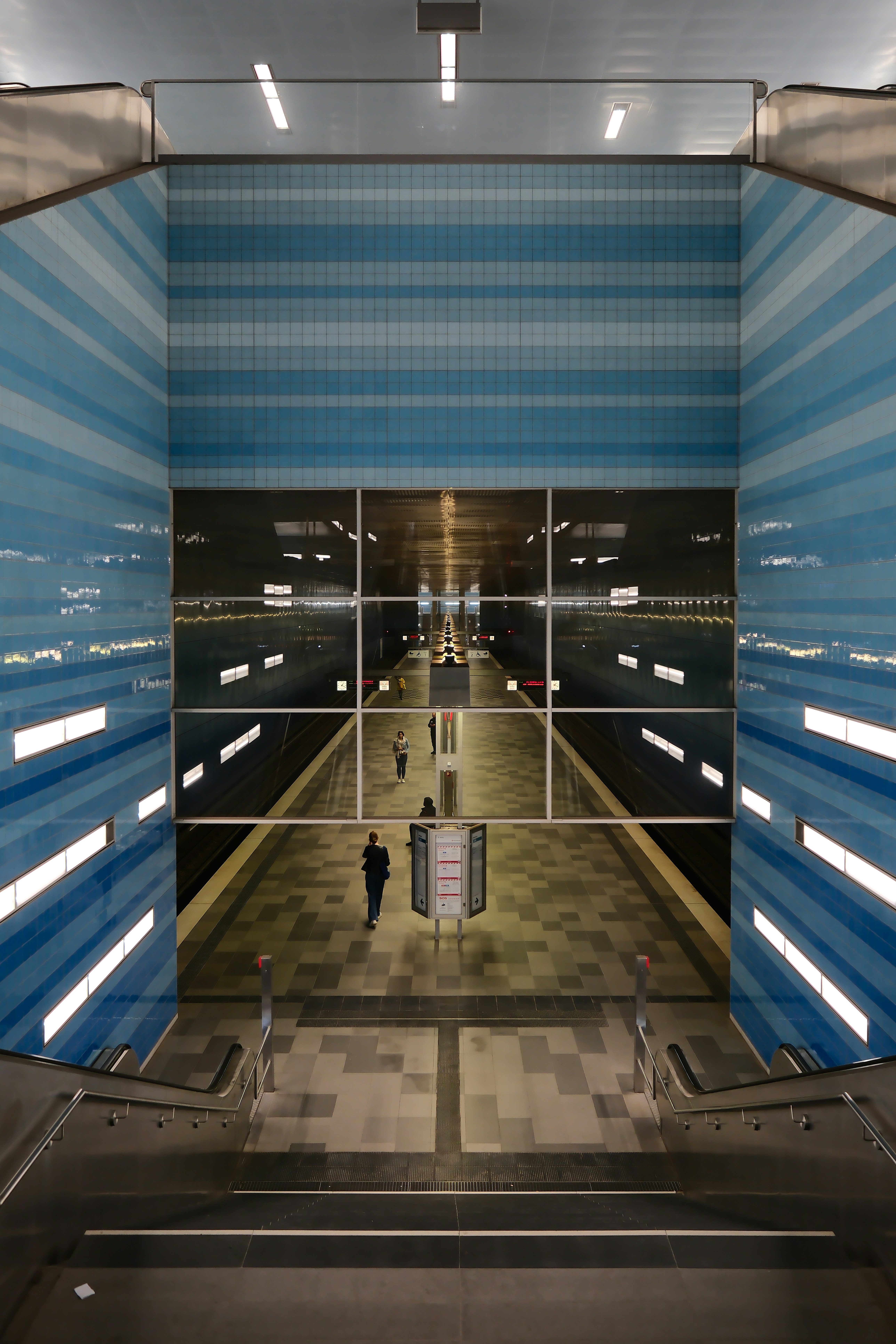 a blue and white building with a checkered floor