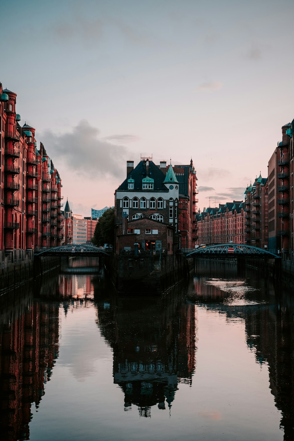 a body of water surrounded by tall buildings