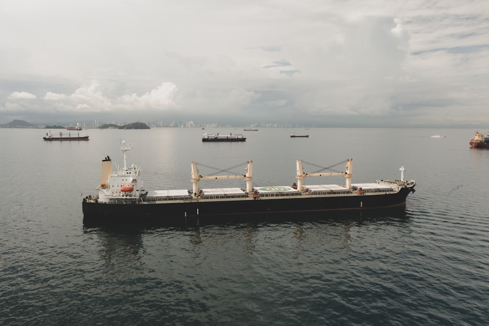 a large boat floating on top of a large body of water