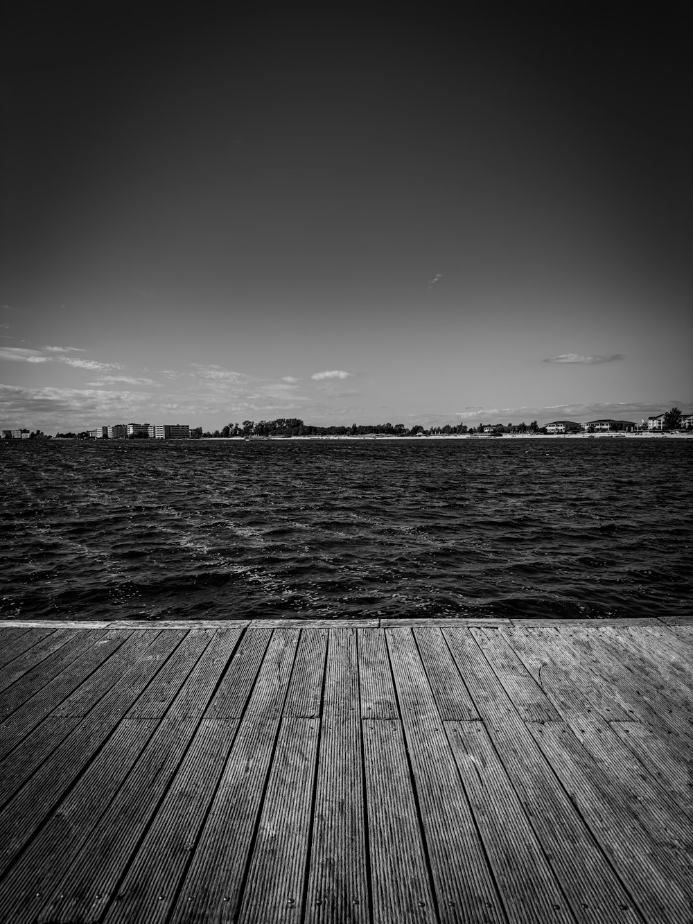 a black and white photo of a dock