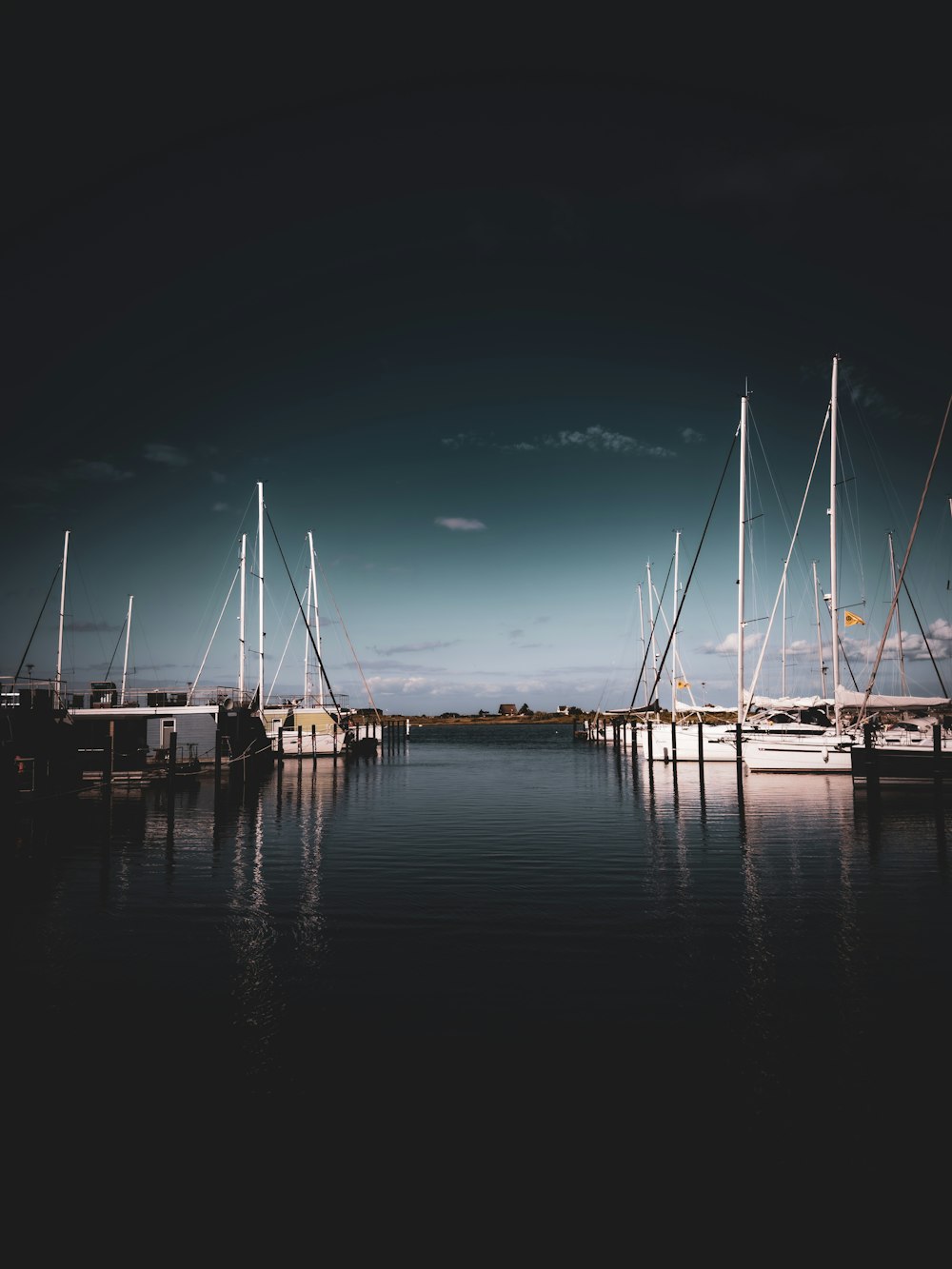 a bunch of boats that are sitting in the water