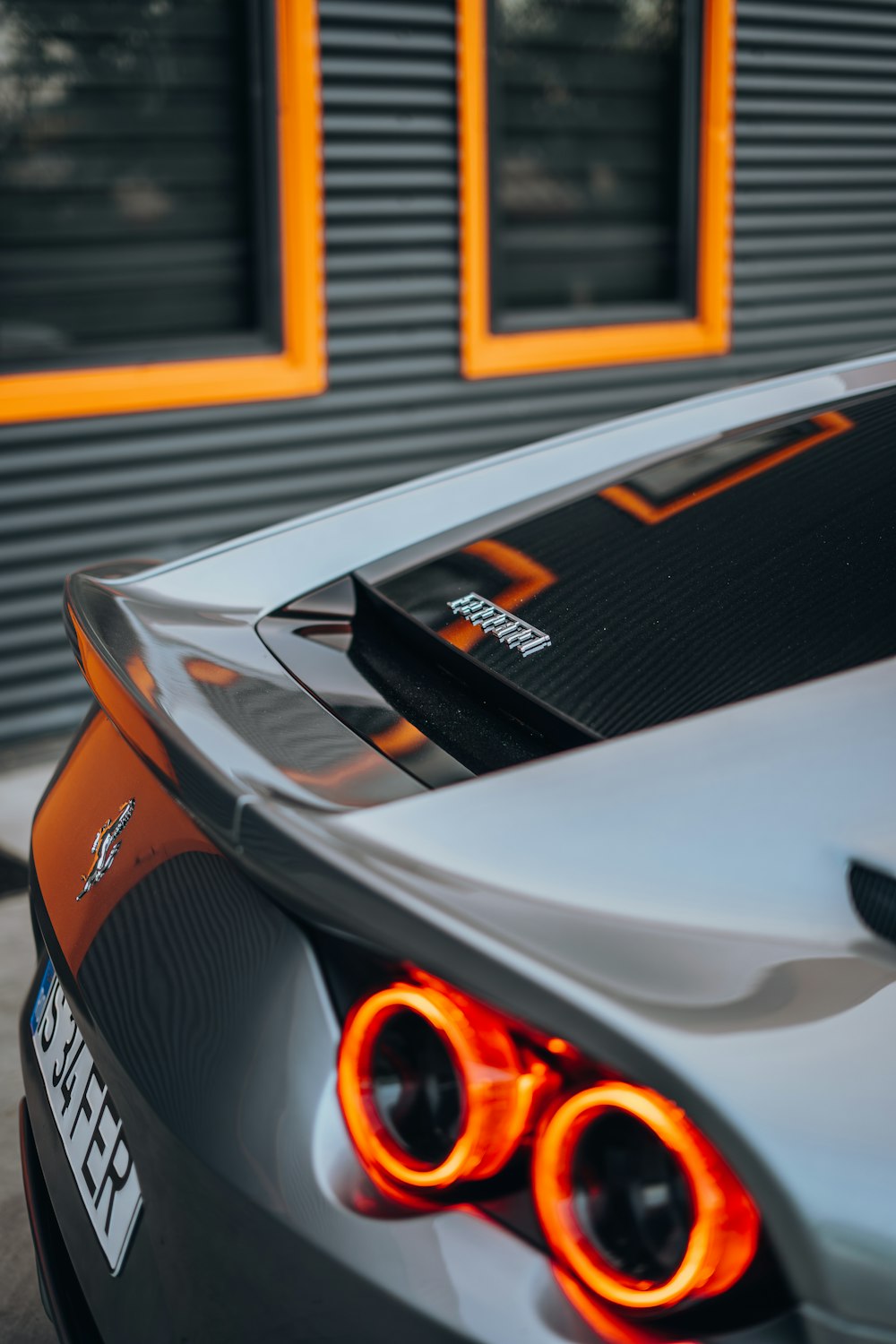 a close up of the tail lights of a sports car
