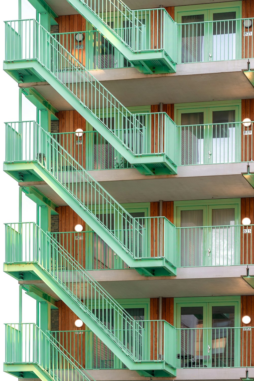 a tall building with balconies and balconies on the balconies