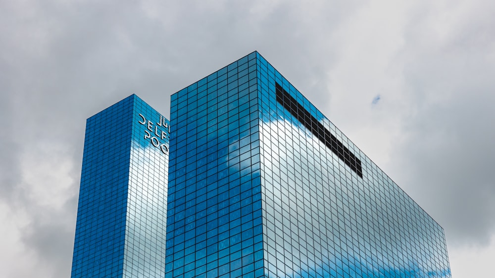 a very tall building with a sky background