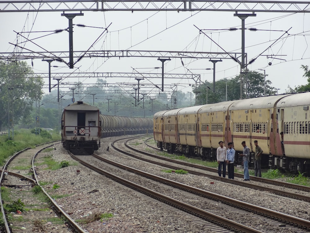 a couple of trains that are sitting on the tracks