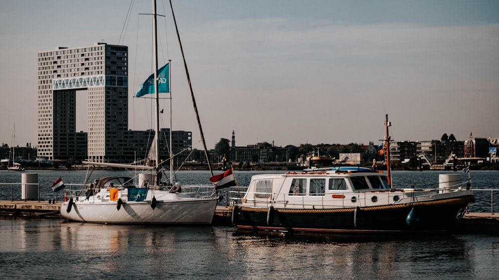 a couple of boats that are sitting in the water